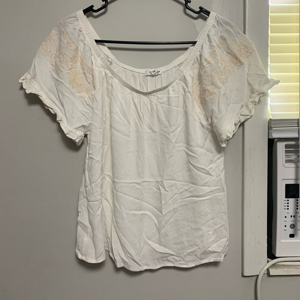 Never worn medium low shoulder